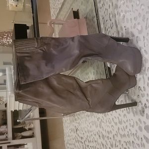 Colin Stewart high heeled knee-high faux leather boots.